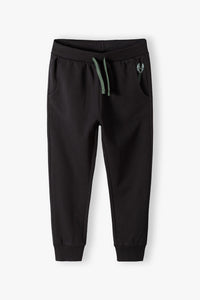 Graphite sweatpants with a key print in the pocket