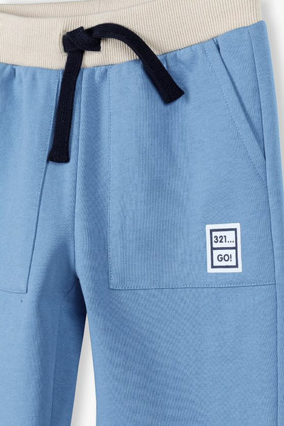 Knitted sweatpants for a boy - blue