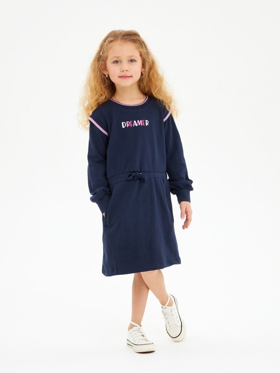 A navy blue knitted dress with the Dreamer inscription