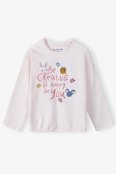 Girls' pink cotton blouse with a soft print