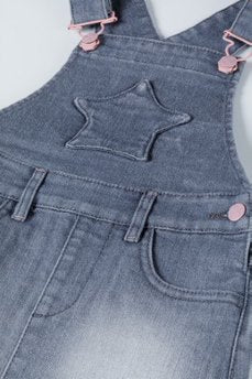 Girl's denim dress with a star at the front