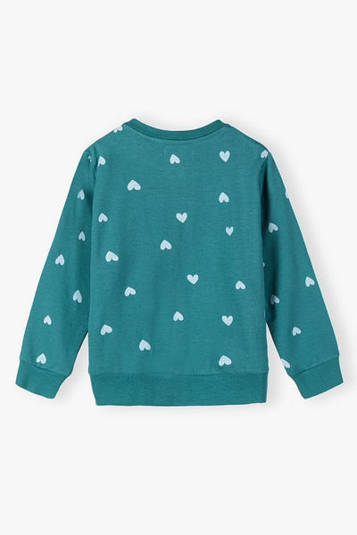 Green sweater with hearts