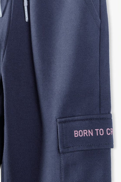 Sweatpants with a decorative pocket - gray